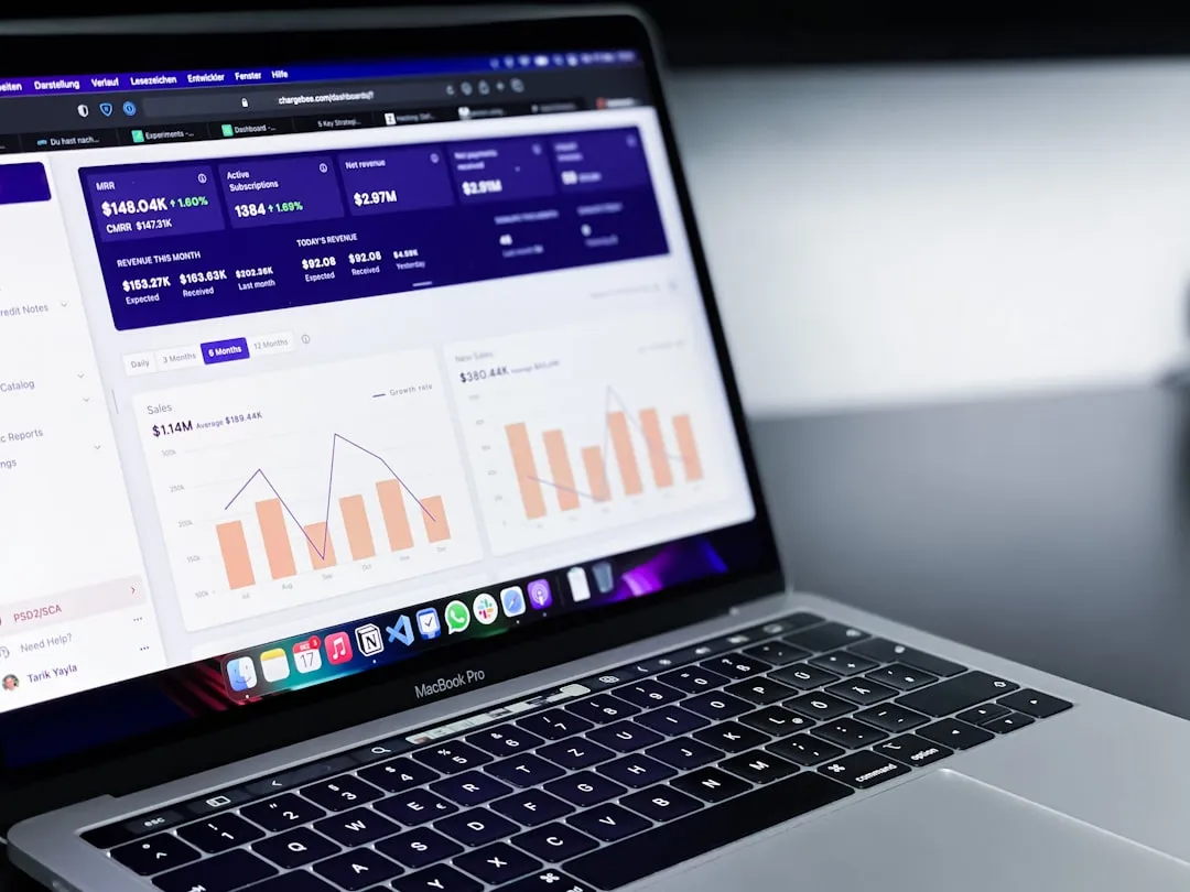 A small business owner calculating lead generation ROI with a calculator and spreadsheet, an AXZ Lead guide.