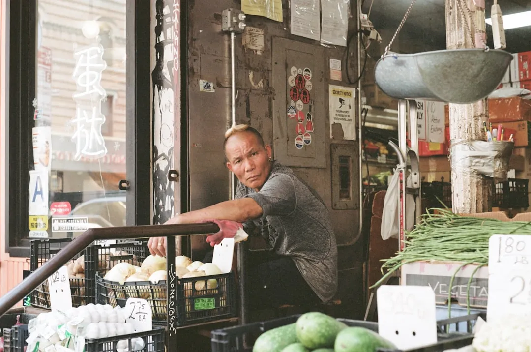 Hand holding a personalized letter with a property background, for real estate investors by AXZ Lead.